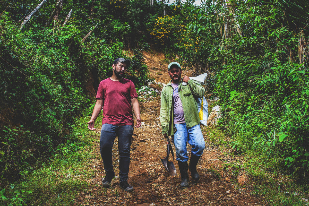 image of Benjamin Paz and farmer